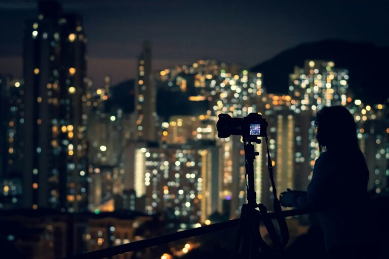 black telescope on top of building during night time